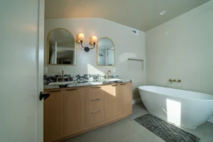 Elegant Bathroom with Freestanding Tub- Ground Up Builders