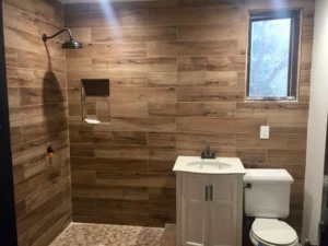 Modern Bathroom Remodel with Wood-like tiles- Ground Up Builders