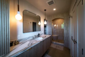 Stylish Bathroom with Marble Vanity- Ground Up Builders