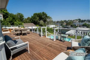 Custom Hilltop Deck with Pool View- Ground Up Builders