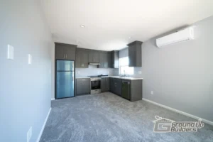 Modern Kitchen Dark Cabinets- Ground Up Builders