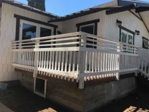 Modern White Wooden Deck with Railing- Ground Up Builders