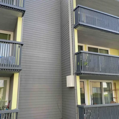 Multifamily Building with New Grey- Ground Up Builders