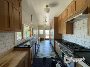 renovated kitchen by Ground Up Builders