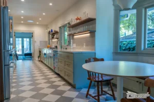 Bright Kitchen with Checkered Floor- Ground Up Builders