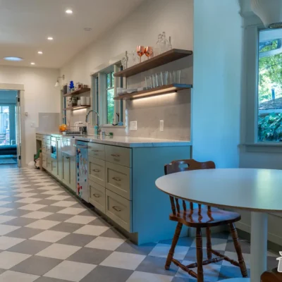 Bright Kitchen with Checkered Floor- Ground Up Builders