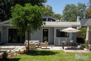 Modern Backyard Patio with Dining Area- Ground Up Builders