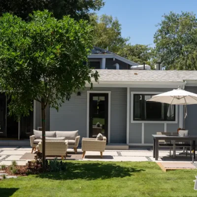 Modern Backyard Patio with Dining Area- Ground Up Builders