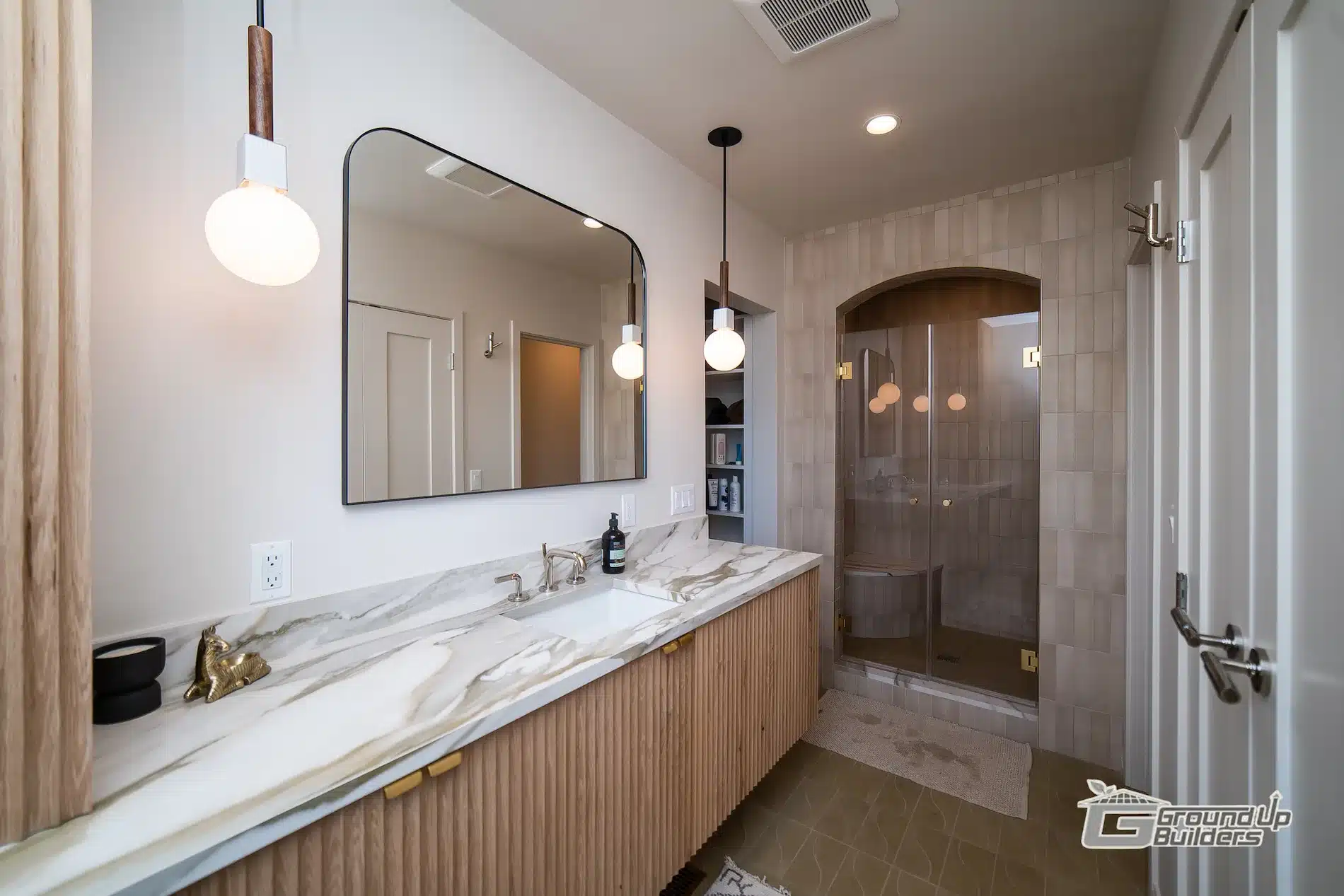 Remodeled Bathroom Walk-In Shower- Ground Up Builders