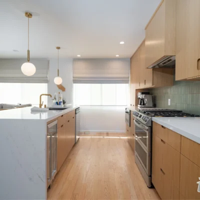 Sleek Galley Kitchen Renovation- Ground Up Builders