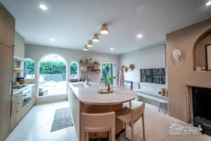 Stylish ADU Kitchen with Arched Windows- Ground Up Builders