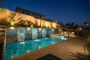 Backyard Pool and Spa with Night Lighting in Fontana, CA | Ground Up Builders