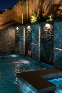 Backyard Waterfalls and Night Lighting in Fontana, CA | Ground Up Builders