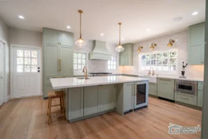 Wide-Angle Kitchen View with Center Island and Brass Accents | Ground Up Builders