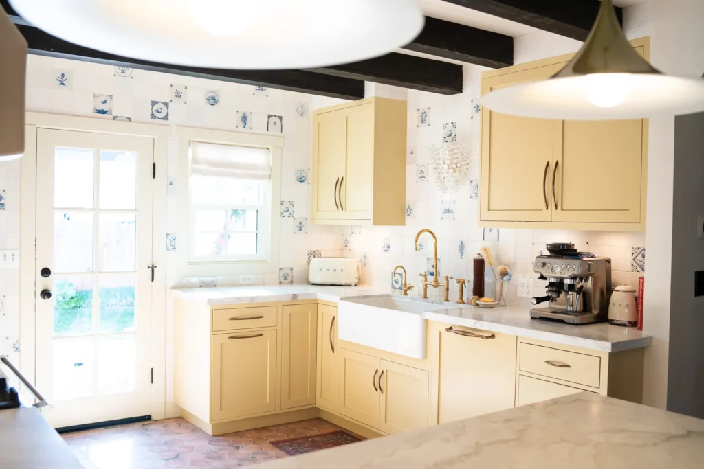 Modern kitchen with light wood cabinets