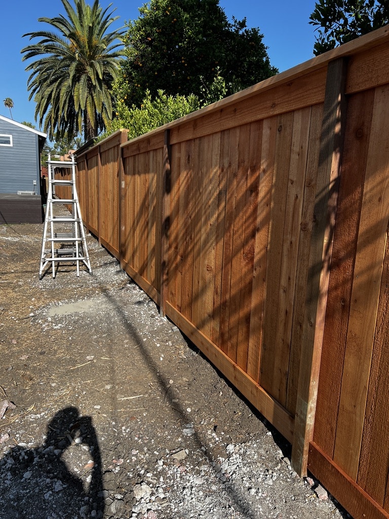 Fence run after in a redwood fence project in Hyde Park, Los Angeles