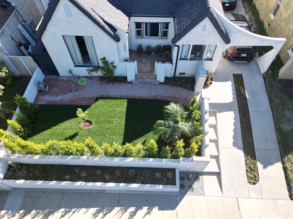 Front yard after in a roofing and hardscape project in Hyde Park, Los Angeles