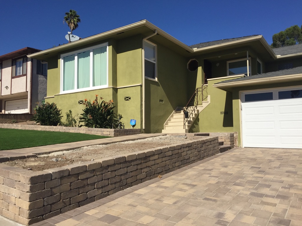 Yard after in a paver and artificial turf project in View Park-Windsor Hills, Los Angeles