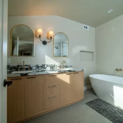 Elegant Bathroom with Freestanding Tub- Ground Up Builders