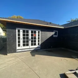 Modern home addition under construction - Ground Up Builders